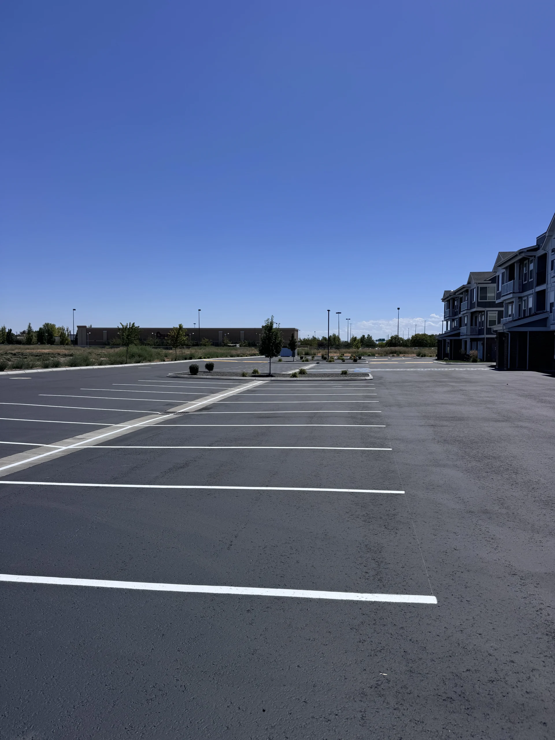 Newly paved and striped multifamily parking lot in Treasure Valley