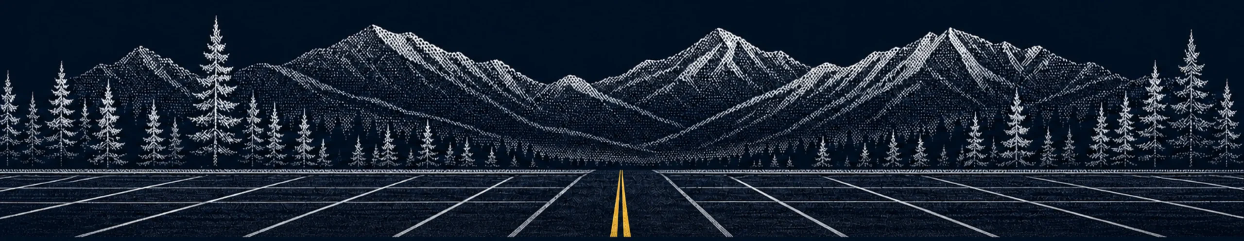 Treasure Valley mountains and pine trees overlooking a freshly striped asphalt parking lot