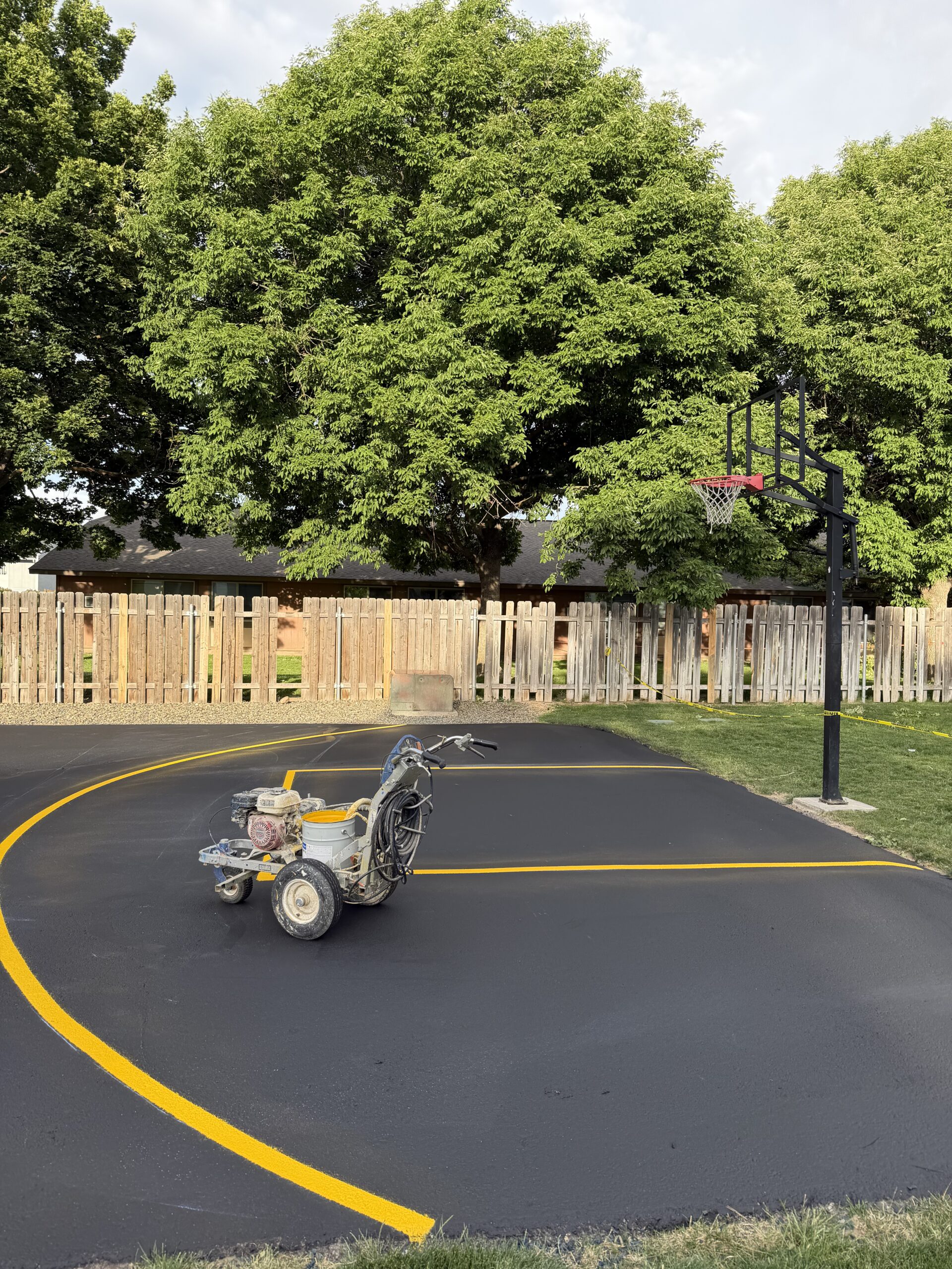 Freshly sealcoated parking lot surface