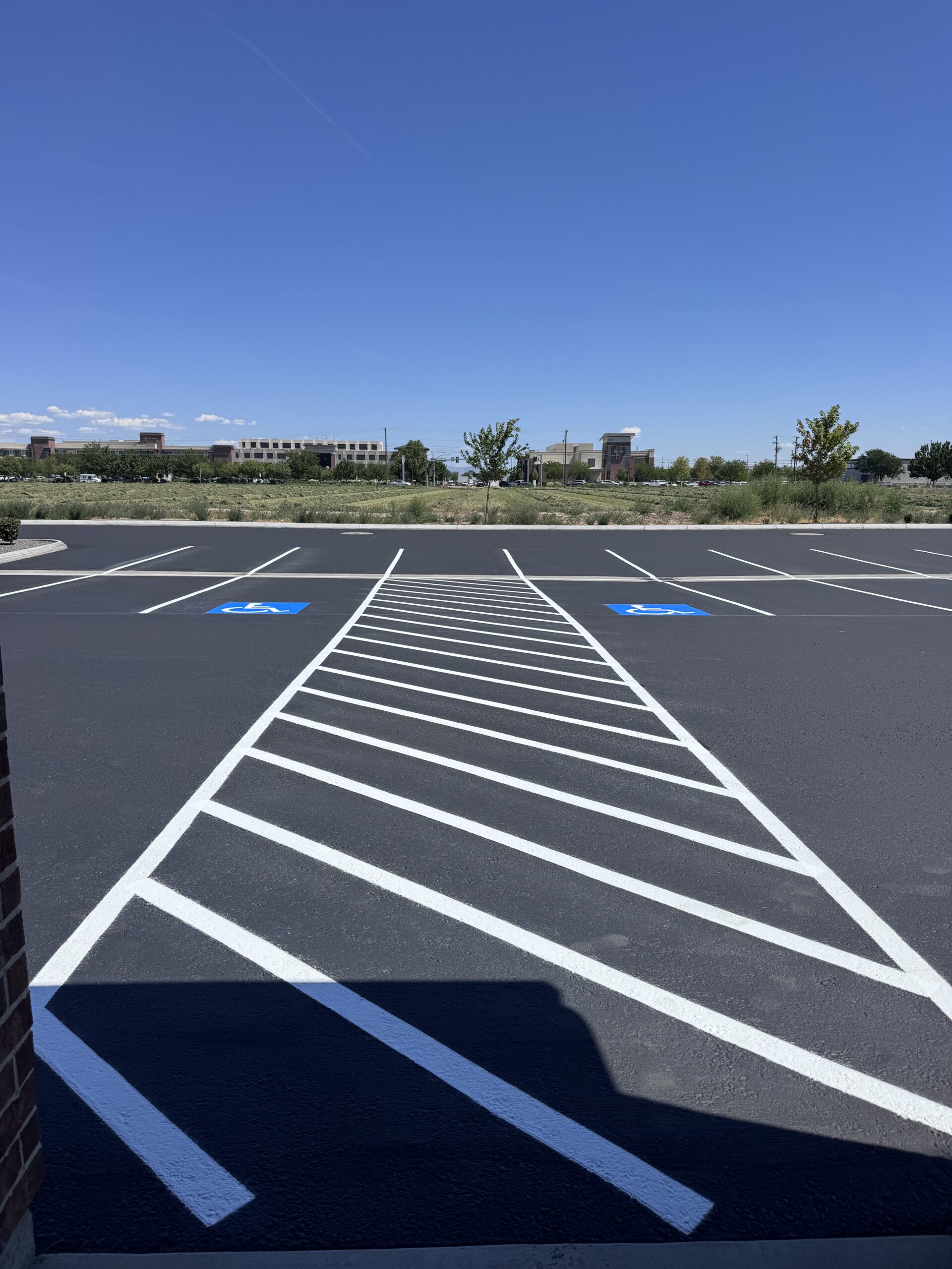 Parking lot maintenance equipment