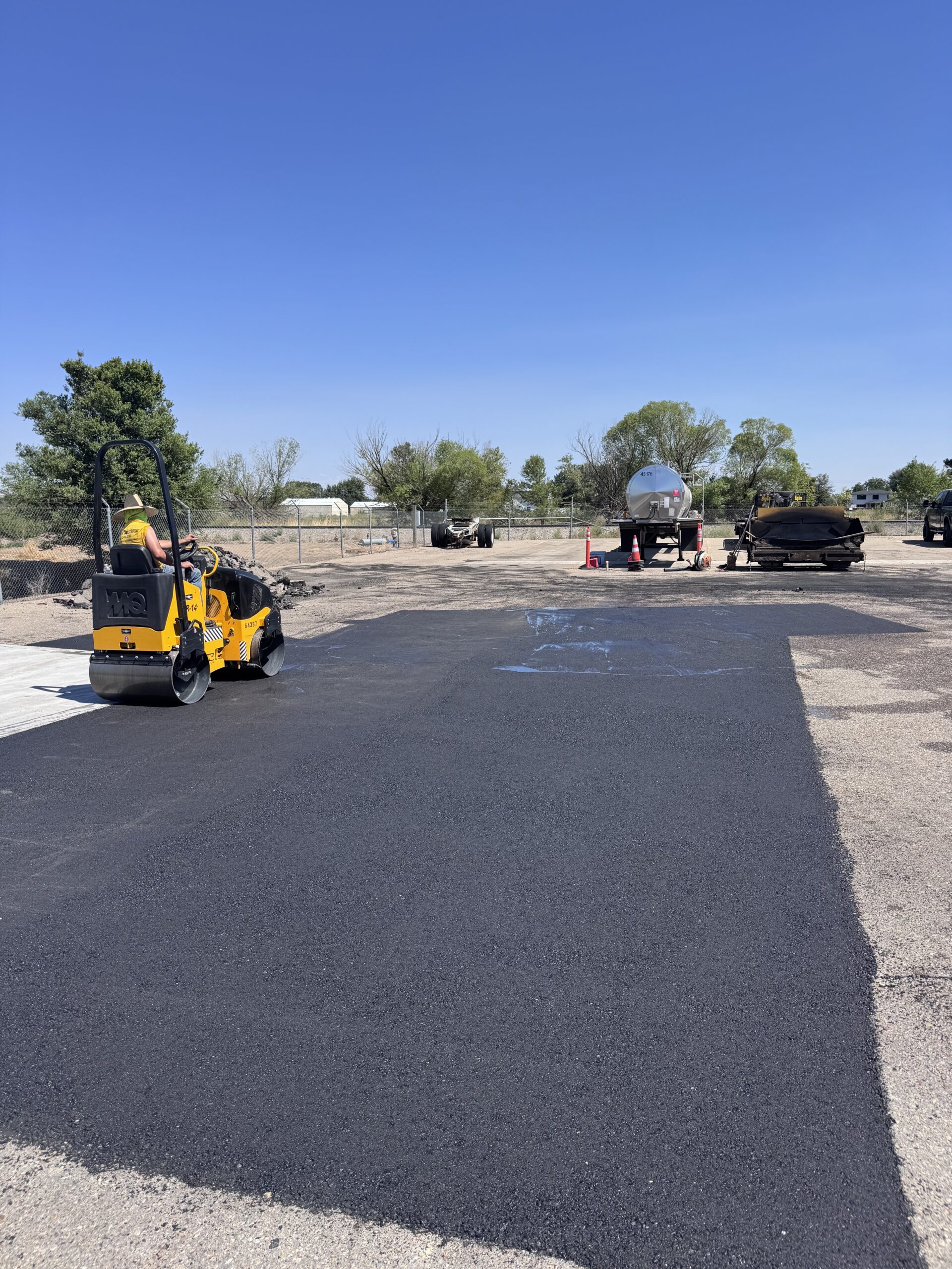 Applying water during compaction